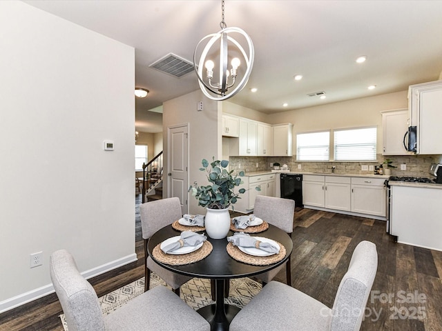 134 Kerri Dawn Ln Unit 117, Locust, NC 28097 - dining space featuring a chandelier, dark wood-type flooring, stairs, baseboards, and recessed lighting