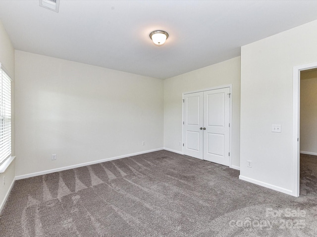 134 Kerri Dawn Ln Unit 117, Locust, NC 28097 - unfurnished bedroom featuring carpet floors and baseboards