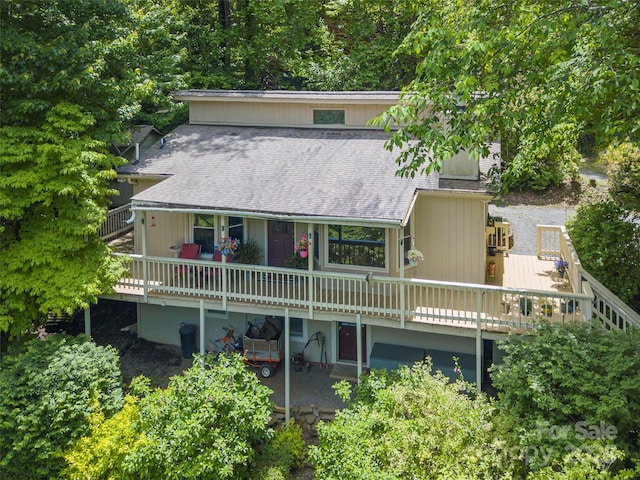227 Soco Acres Rd, Maggie Valley, NC 28751 - back of house with roof with shingles and a wooden deck