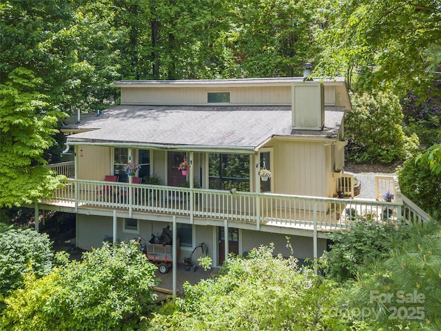 227 Soco Acres Rd, Maggie Valley, NC 28751 - rear view of property with a deck and roof with shingles