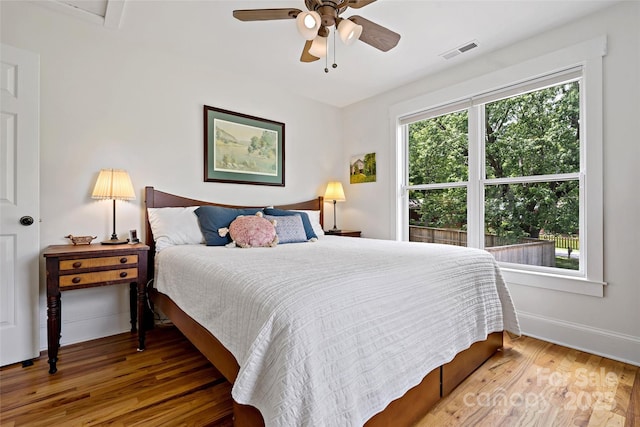 24 Browndale Rd, Asheville, NC 28805 - bedroom with wood finished floors, baseboards, and ceiling fan