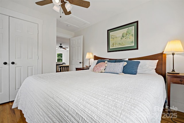 24 Browndale Rd, Asheville, NC 28805 - bedroom with wood finished floors, a closet, a ceiling fan, and attic access
