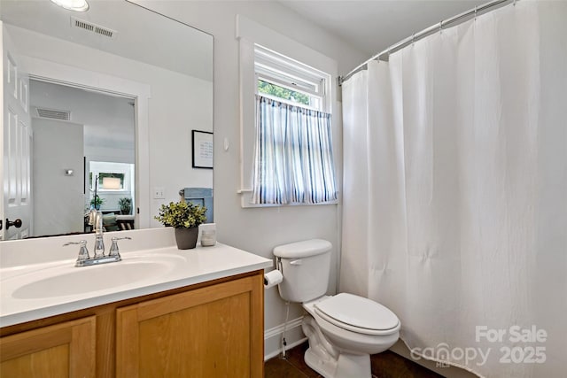 24 Browndale Rd, Asheville, NC 28805 - full bathroom with toilet, baseboards, vanity, and a shower with curtain