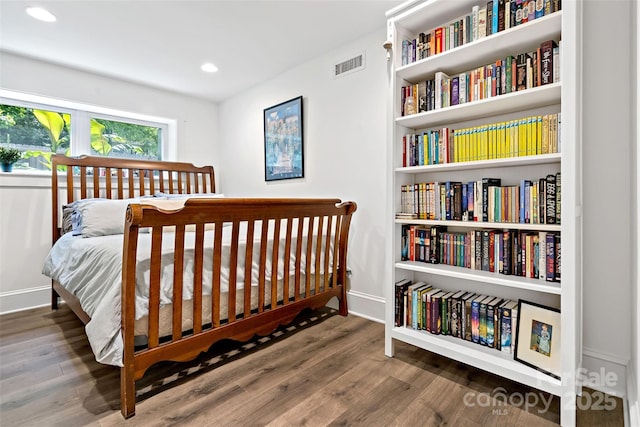 24 Browndale Rd, Asheville, NC 28805 - bedroom featuring wood finished floors, recessed lighting, and baseboards