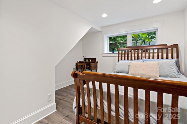 24 Browndale Rd, Asheville, NC 28805 - bedroom with baseboards, wood finished floors, recessed lighting, and lofted ceiling