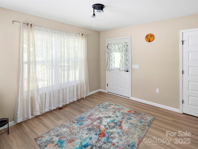 87 Markley Dr, Flat Rock, NC 28731 - entrance foyer featuring wood finished floors and baseboards