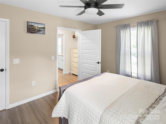 87 Markley Dr, Flat Rock, NC 28731 - bedroom featuring wood finished floors, baseboards, a ceiling fan, and a closet