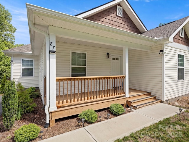 87 Markley Dr, Flat Rock, NC 28731 - view of front of house with covered porch and a shingled roof