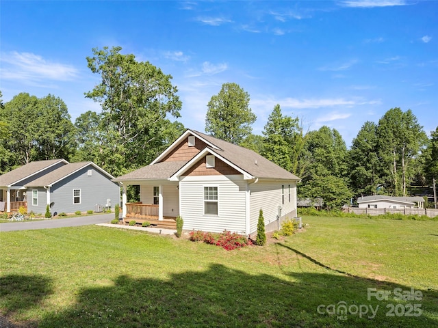 87 Markley Dr, Flat Rock, NC 28731 - view of front of home with a front lawn and a porch