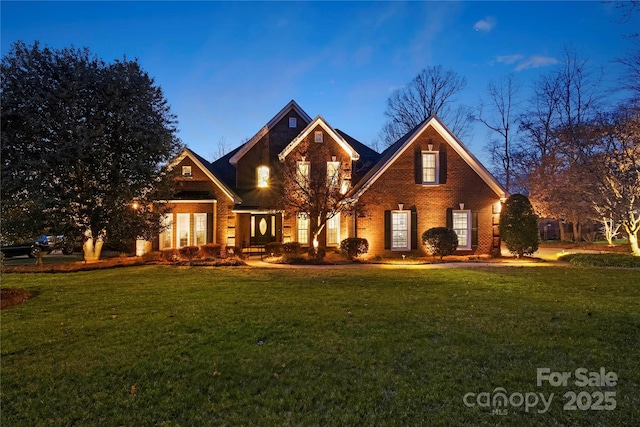 3115 Duck Point Dr, Monroe, NC 28110 - view of front facade featuring a front yard and brick siding
