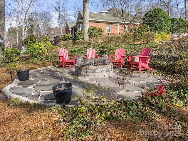 3115 Duck Point Dr, Monroe, NC 28110 - view of patio / terrace featuring a fire pit and fence