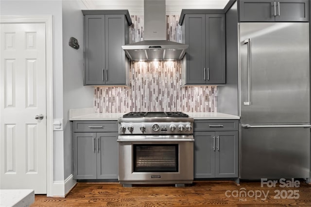 3115 Duck Point Dr, Monroe, NC 28110 - kitchen with high quality appliances, range hood, gray cabinetry, and tasteful backsplash