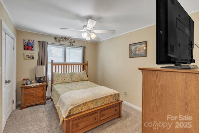 bedroom with light carpet, baseboards, ornamental molding, and ceiling fan