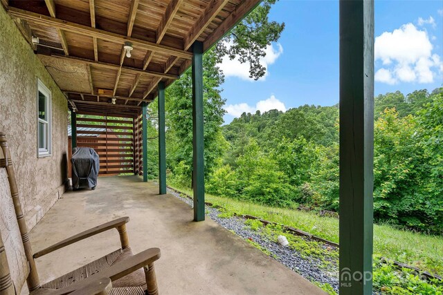 2097 Pinnacle Pkwy Unit 14, Union Mills, NC 28167 - view of patio / terrace featuring a grill and a wooded view