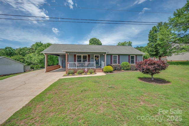 136 Coventry Ln, Forest City, NC 28043 - ranch-style house featuring covered porch, driveway, a front yard, and a carport