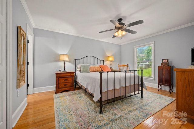 136 Coventry Ln, Forest City, NC 28043 - bedroom featuring light wood finished floors, crown molding, and baseboards