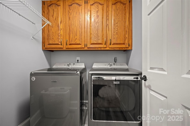 136 Coventry Ln, Forest City, NC 28043 - laundry room with washer and dryer and cabinet space
