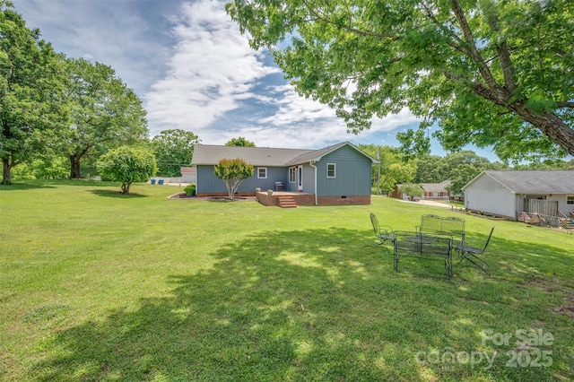 136 Coventry Ln, Forest City, NC 28043 - view of grassy yard featuring a wooden deck