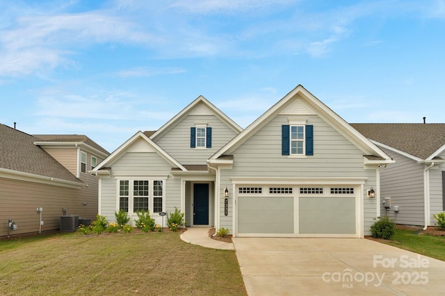 7332 Jolly Brook Dr, Charlotte, NC 28215 - traditional-style house featuring driveway, an attached garage, a front yard, and central AC