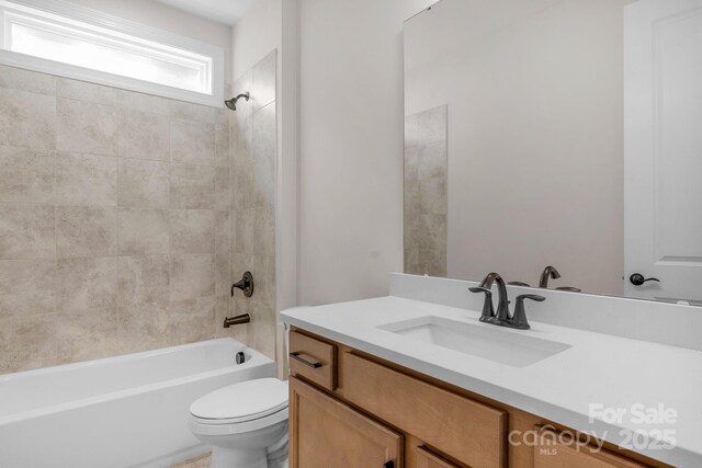 7332 Jolly Brook Dr, Charlotte, NC 28215 - full bathroom featuring vanity, toilet, and shower / bathtub combination