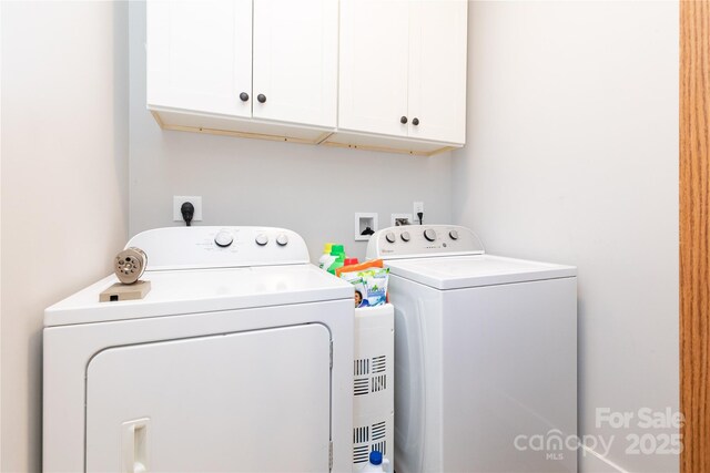 138 Foxden Dr Unit 102, Fletcher, NC 28732 - laundry area featuring cabinet space and washing machine and dryer