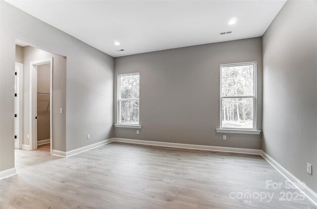 7517 Lancaster Hwy Unit 5, Waxhaw, NC 28173 - unfurnished room featuring baseboards, light wood finished floors, and recessed lighting