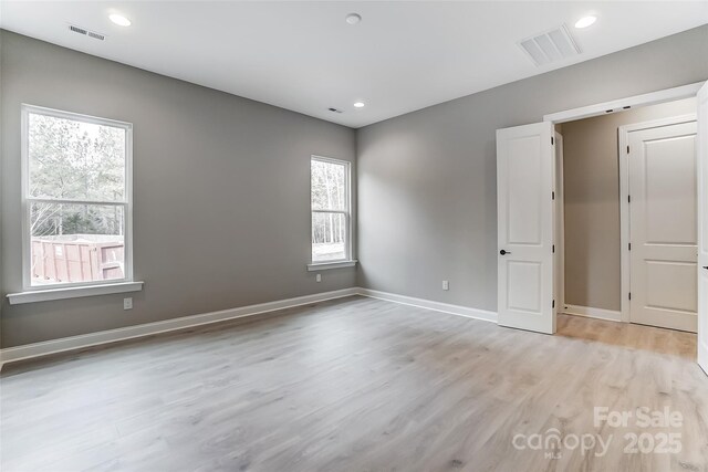 7517 Lancaster Hwy Unit 5, Waxhaw, NC 28173 - unfurnished room with light wood-style flooring, baseboards, and recessed lighting