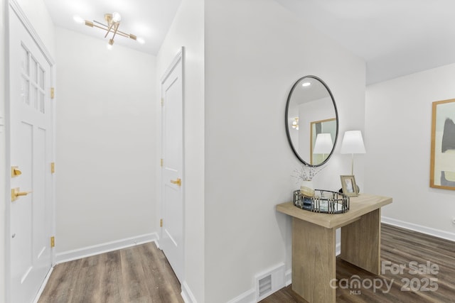 4226 Randolph Rd, Charlotte, NC 28211 - foyer entrance featuring dark wood finished floors and baseboards
