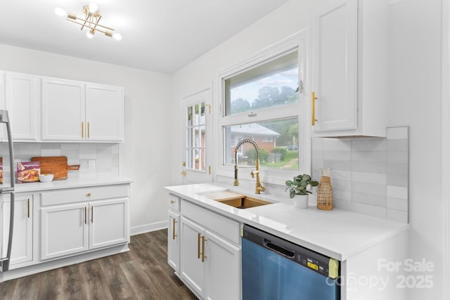 4226 Randolph Rd, Charlotte, NC 28211 - kitchen with dishwasher, a sink, tasteful backsplash, white cabinets, and light countertops