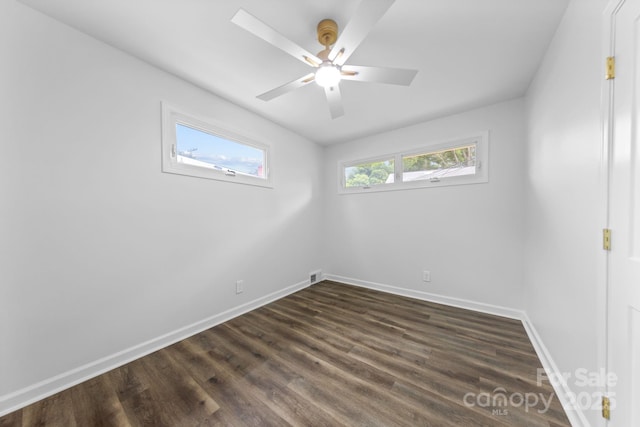4226 Randolph Rd, Charlotte, NC 28211 - spare room with baseboards, dark wood-style floors, and a ceiling fan