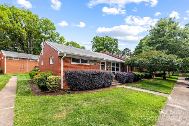 4226 Randolph Rd, Charlotte, NC 28211 - view of front of property with a front lawn and brick siding