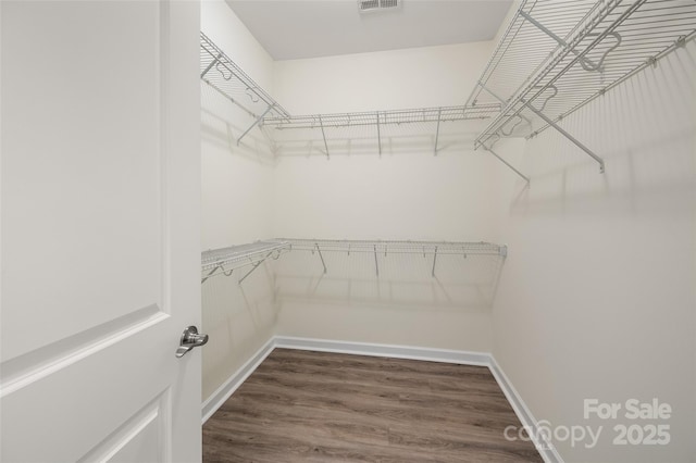 10502 Old Ardrey Kell Rd, Charlotte, NC 28277 - walk in closet with dark wood finished floors