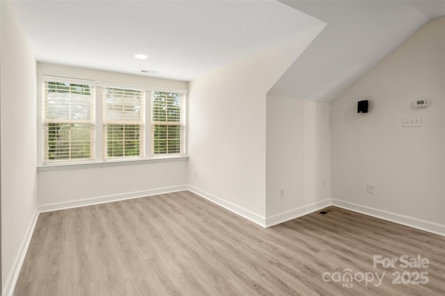 10502 Old Ardrey Kell Rd, Charlotte, NC 28277 - bonus room featuring wood finished floors, baseboards, lofted ceiling, and recessed lighting
