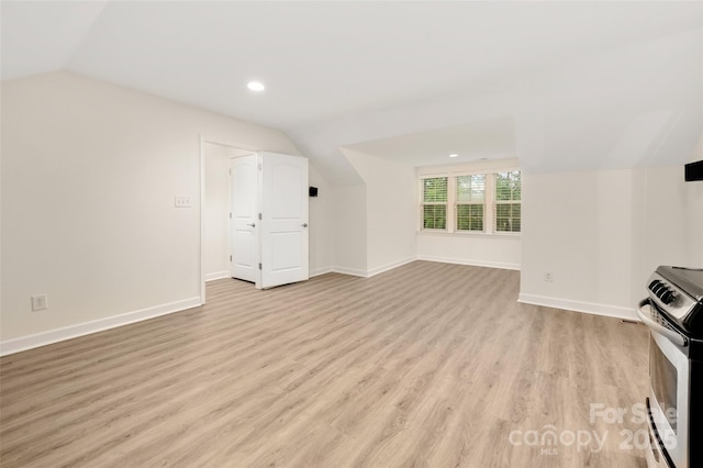 10502 Old Ardrey Kell Rd, Charlotte, NC 28277 - unfurnished living room featuring vaulted ceiling, light wood-type flooring, recessed lighting, and baseboards