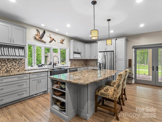 4290 Black Bear Trl, Morganton, NC 28655 - kitchen with stainless steel appliances, gray cabinets, healthy amount of natural light, and recessed lighting