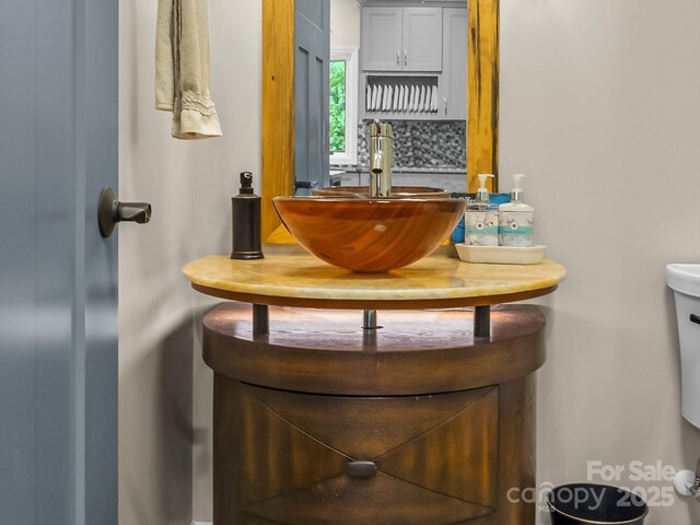 4290 Black Bear Trl, Morganton, NC 28655 - bathroom with backsplash, vanity, and toilet