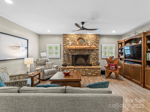 4290 Black Bear Trl, Morganton, NC 28655 - living area with a ceiling fan, light wood-style floors, plenty of natural light, recessed lighting, and a stone fireplace