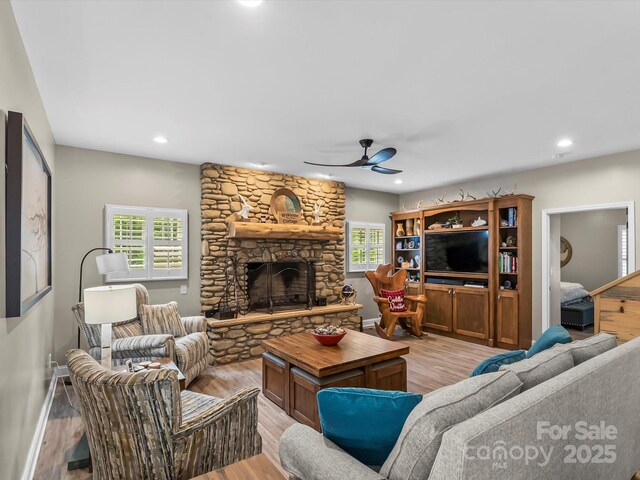 4290 Black Bear Trl, Morganton, NC 28655 - living area featuring ceiling fan, a fireplace, light wood-type flooring, recessed lighting, and baseboards