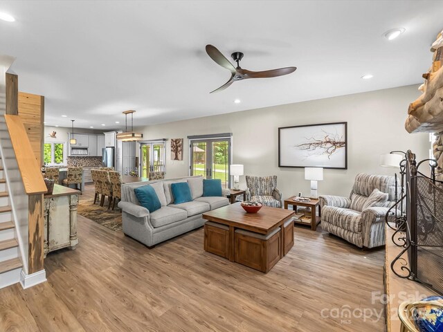 4290 Black Bear Trl, Morganton, NC 28655 - living area with light wood-style flooring, a ceiling fan, recessed lighting, healthy amount of natural light, and stairway