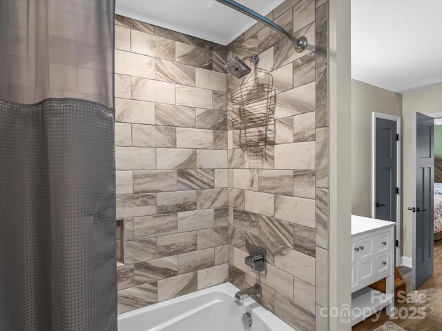 4290 Black Bear Trl, Morganton, NC 28655 - ensuite bathroom featuring shower / bath combination with curtain, wood finished floors, and vanity