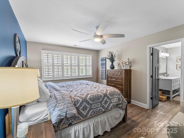 4290 Black Bear Trl, Morganton, NC 28655 - bedroom with wood finished floors, baseboards, a ceiling fan, and connected bathroom