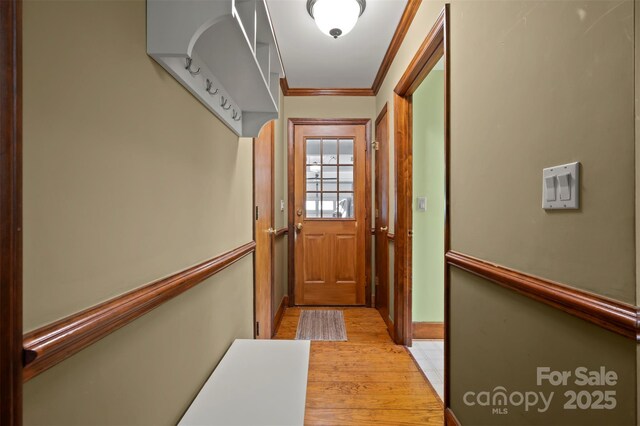 312 Briarwood Dr, Rutherfordton, NC 28139 - doorway to outside featuring light wood-style flooring, ornamental molding, and baseboards