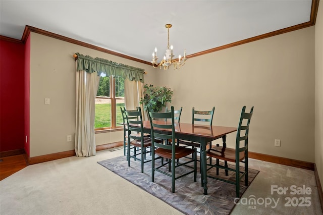 312 Briarwood Dr, Rutherfordton, NC 28139 - carpeted dining area with crown molding, a chandelier, and baseboards