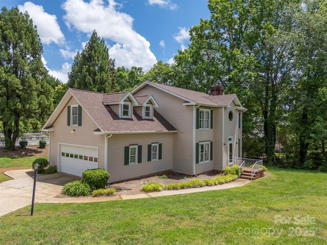 312 Briarwood Dr, Rutherfordton, NC 28139 - view of front of property featuring driveway, a chimney, a garage, and a shingled roof