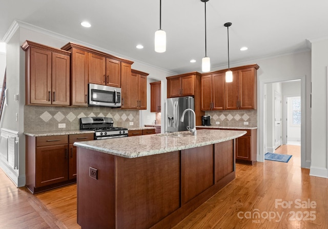2606 Walker Rd, Matthews, NC 28105 - kitchen with appliances with stainless steel finishes, a sink, backsplash, brown cabinets, and crown molding