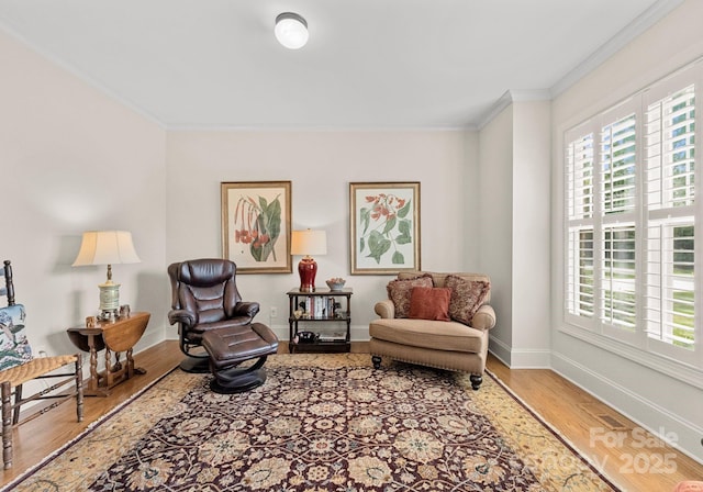 2606 Walker Rd, Matthews, NC 28105 - sitting room featuring crown molding, baseboards, and wood finished floors