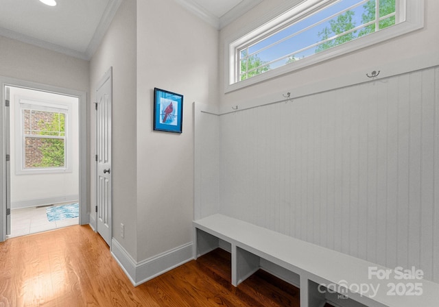 2606 Walker Rd, Matthews, NC 28105 - mudroom with crown molding, light wood-style flooring, and baseboards