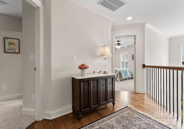 2606 Walker Rd, Matthews, NC 28105 - hall featuring baseboards, crown molding, wood finished floors, and recessed lighting