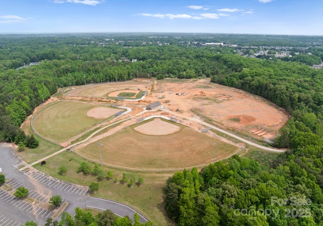 2606 Walker Rd, Matthews, NC 28105 - aerial overview of property's location with a forest