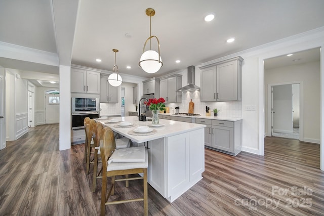 13222 Fiore Pl, Huntersville, NC 28078 - kitchen featuring gray cabinets, wall chimney range hood, oven, decorative backsplash, and recessed lighting